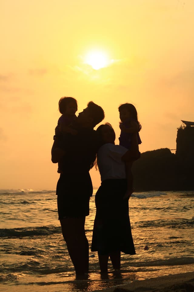 Family enjoying time together at the beach