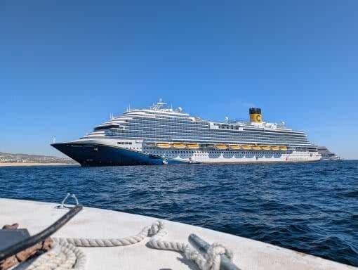 Cruise ship sailing on blue water